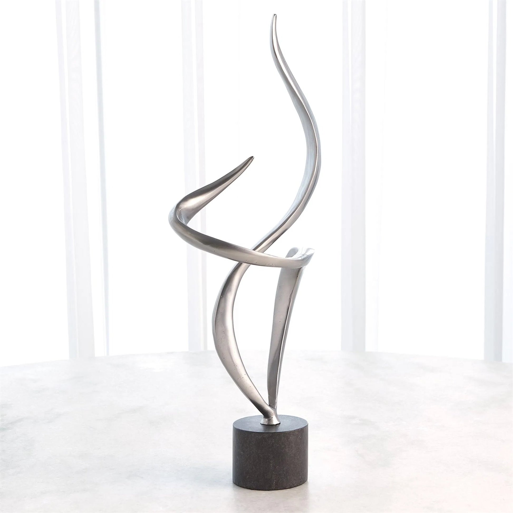 Swirl Metal Sculpture by Global Views in brass and marble. Made from unique in a transitional style.