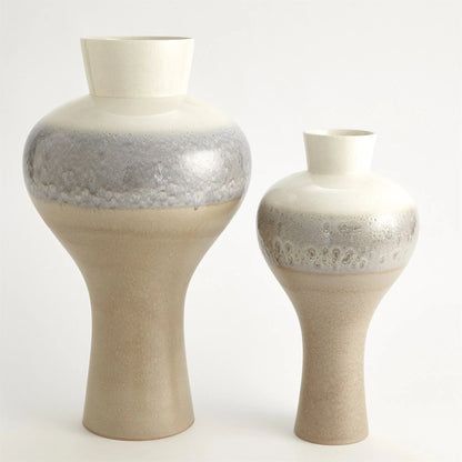 Cream Rises Swell Vase by Global Views in cream and ivory. Made from unique in a modern style.