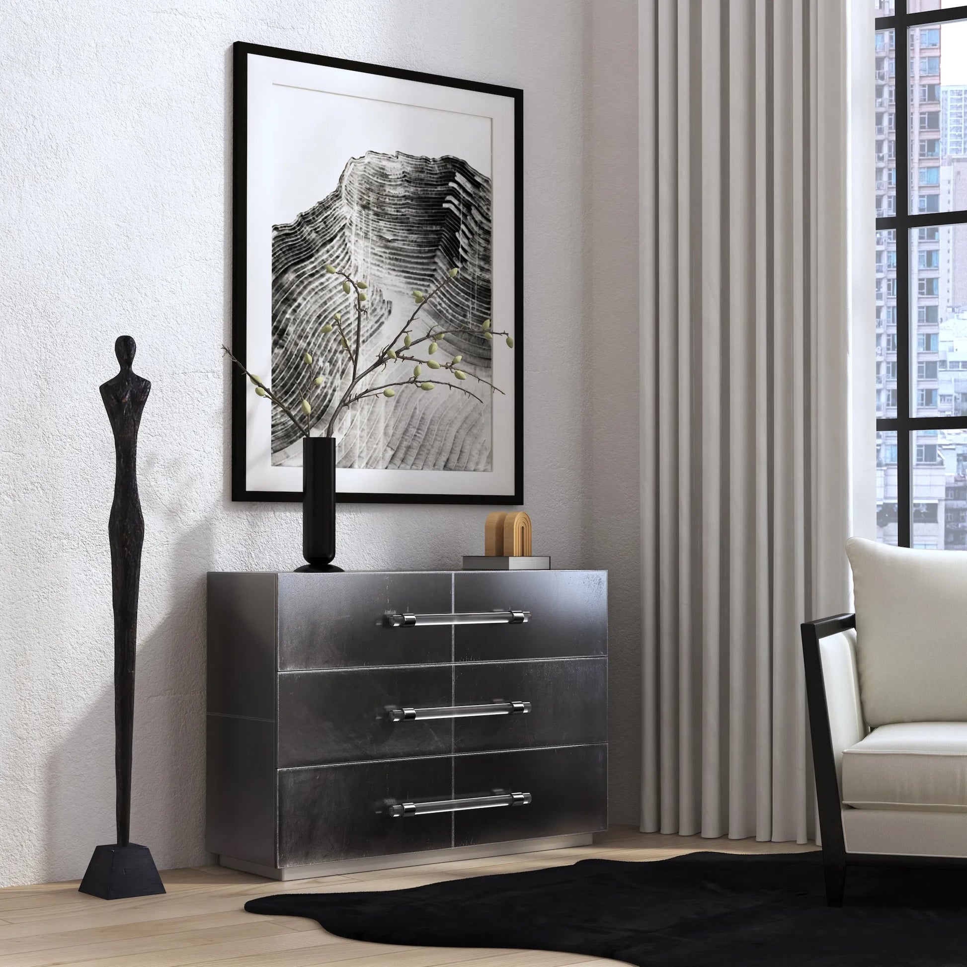 Allman Accent Chest by Butler Specialty Company in silver. Made from mdf, genuine leather, acrylic hardware in a unique style.