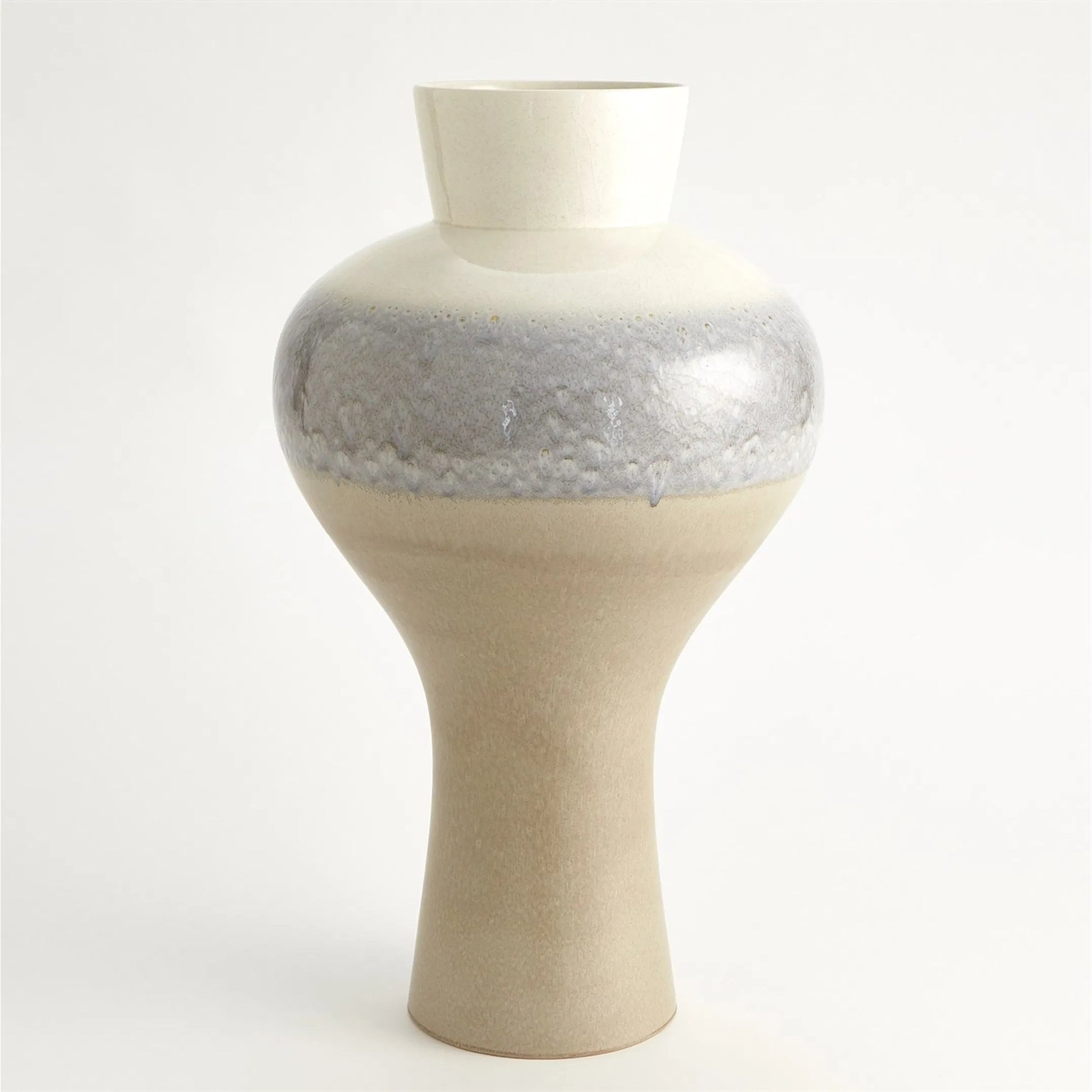 Cream Rises Swell Vase by Global Views in cream and ivory. Made from unique in a modern style.