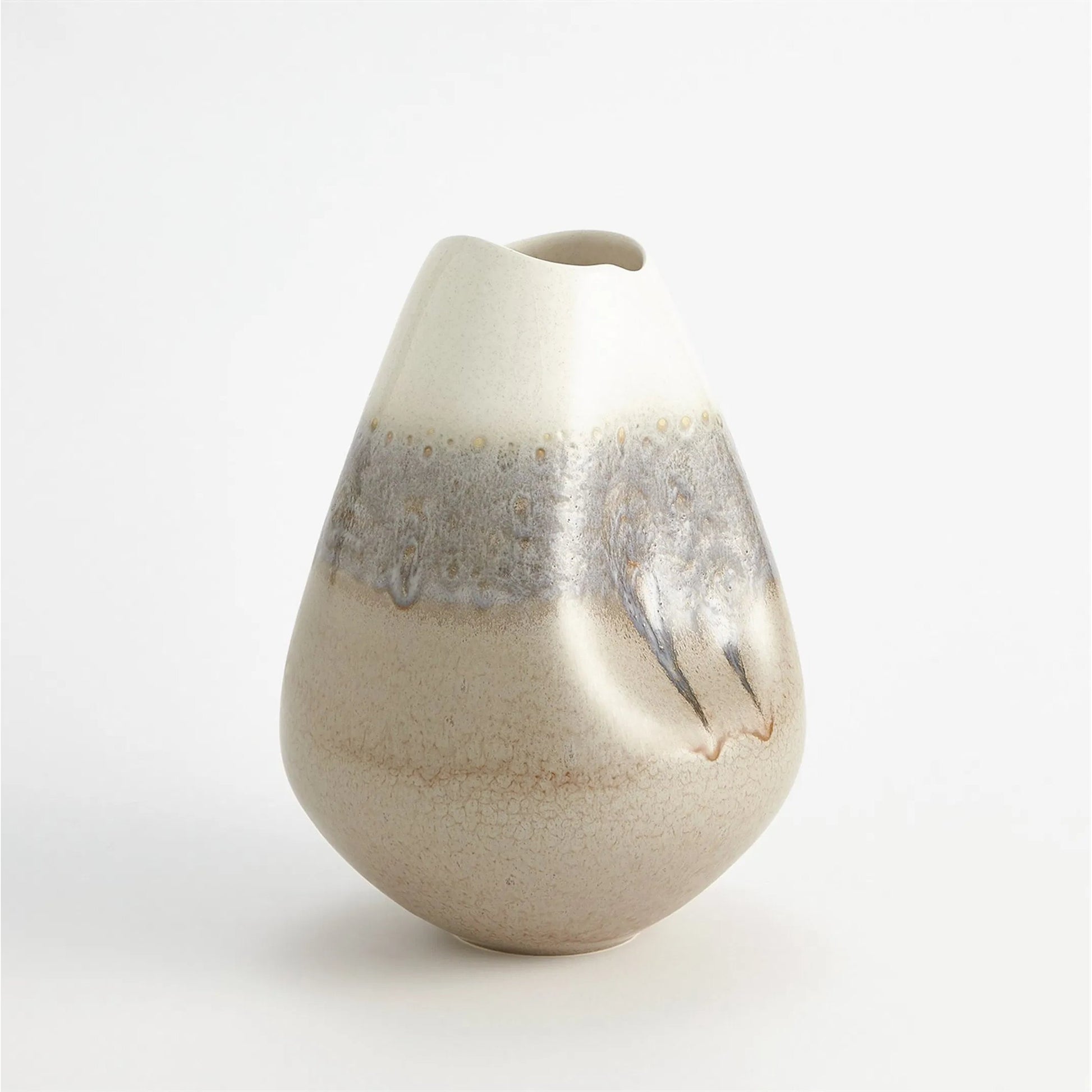 Cream Rises Dented Vase by Global Views in cream and ivory. Made from unique in a modern style.