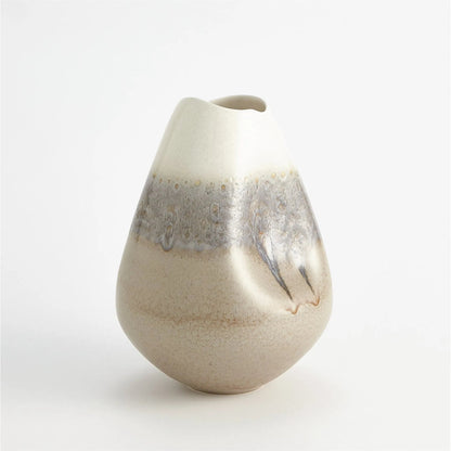 Cream Rises Dented Vase by Global Views in cream and ivory. Made from unique in a modern style.