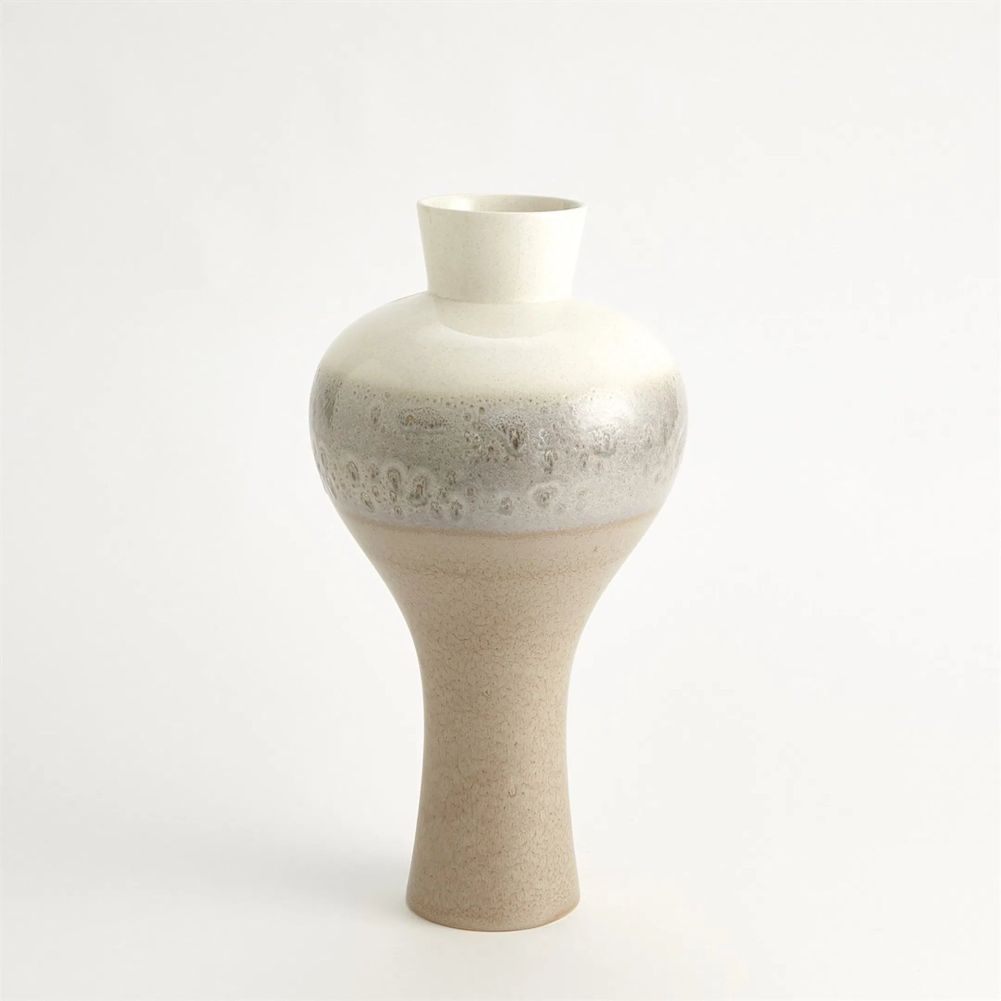 Cream Rises Swell Vase by Global Views in cream and ivory. Made from unique in a modern style.