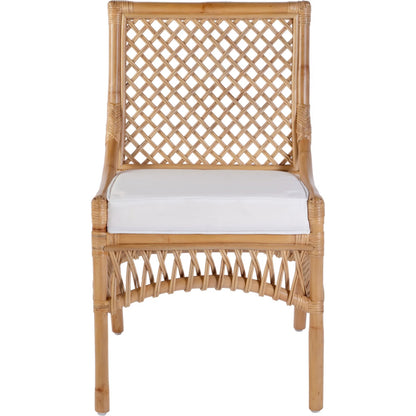 Antigua Dining Chair by Butler Specialty Company in natural rattan. Made from rattan, foam, plywood in a rustic style.