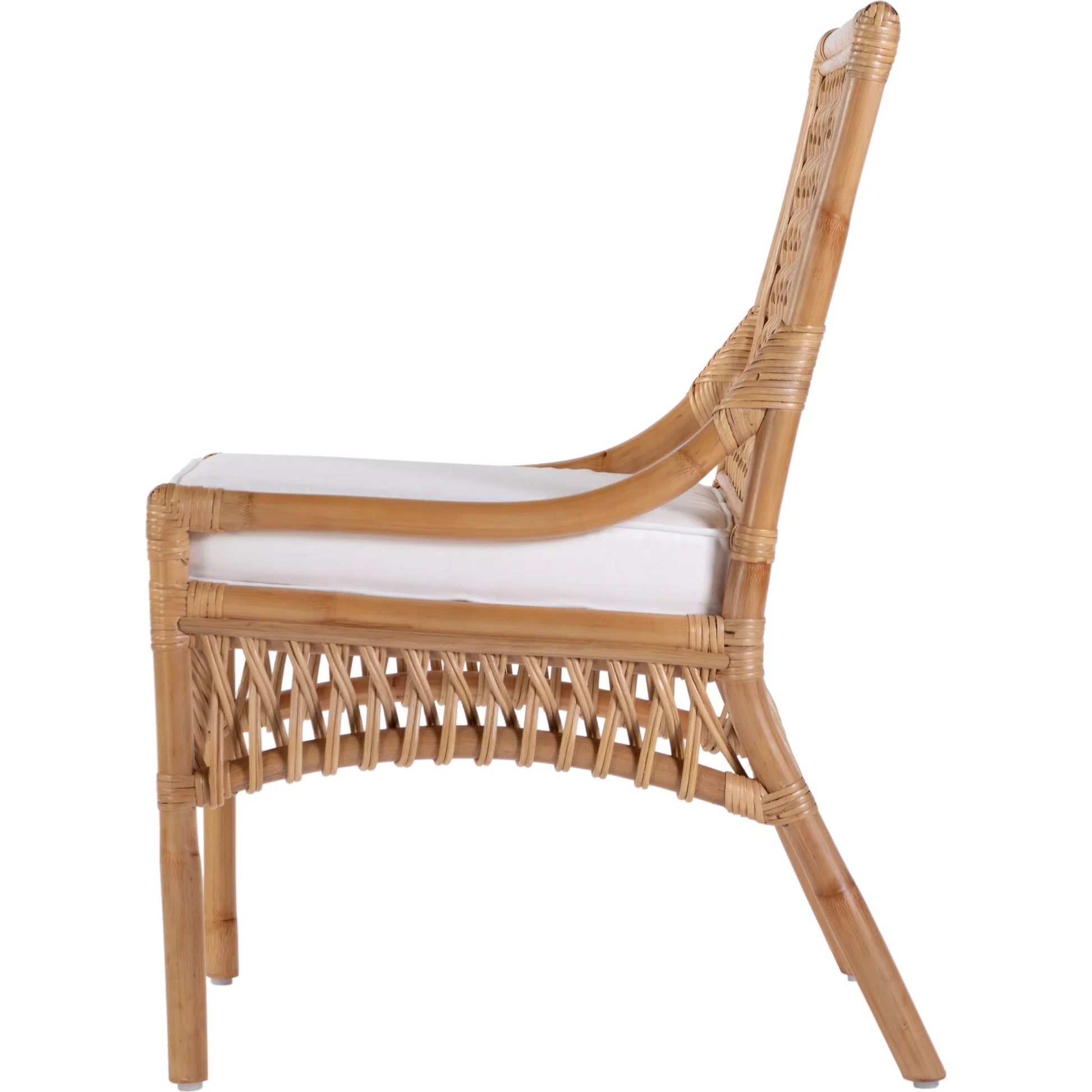 Antigua Dining Chair by Butler Specialty Company in natural rattan. Made from rattan, foam, plywood in a rustic style.