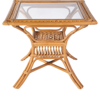 Antigua Dining Table by Butler Specialty Company in natural rattan. Made from rattan, glass in a rustic style.
