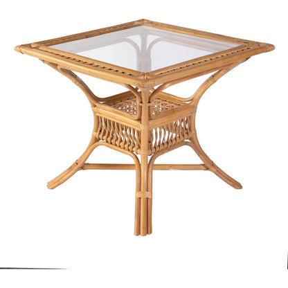 Antigua Dining Table by Butler Specialty Company in natural rattan. Made from rattan, glass in a rustic style.