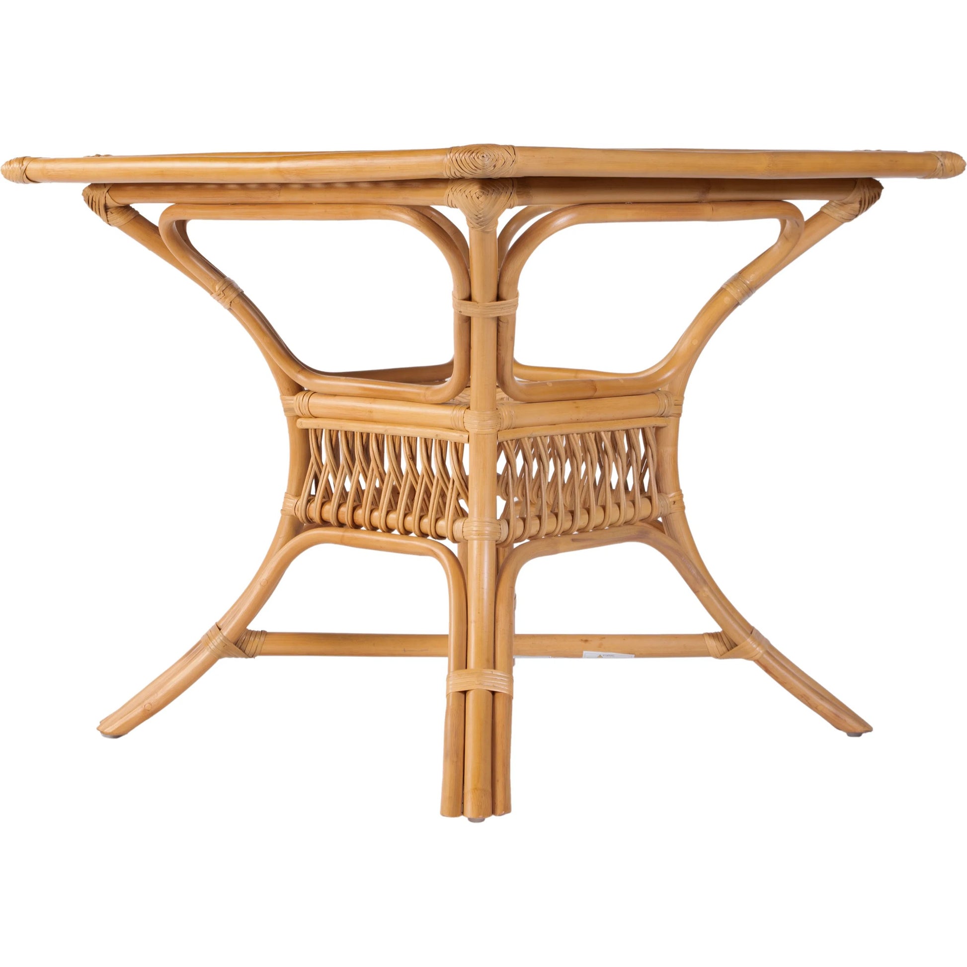 Antigua Dining Table by Butler Specialty Company in natural rattan. Made from rattan, glass in a rustic style.