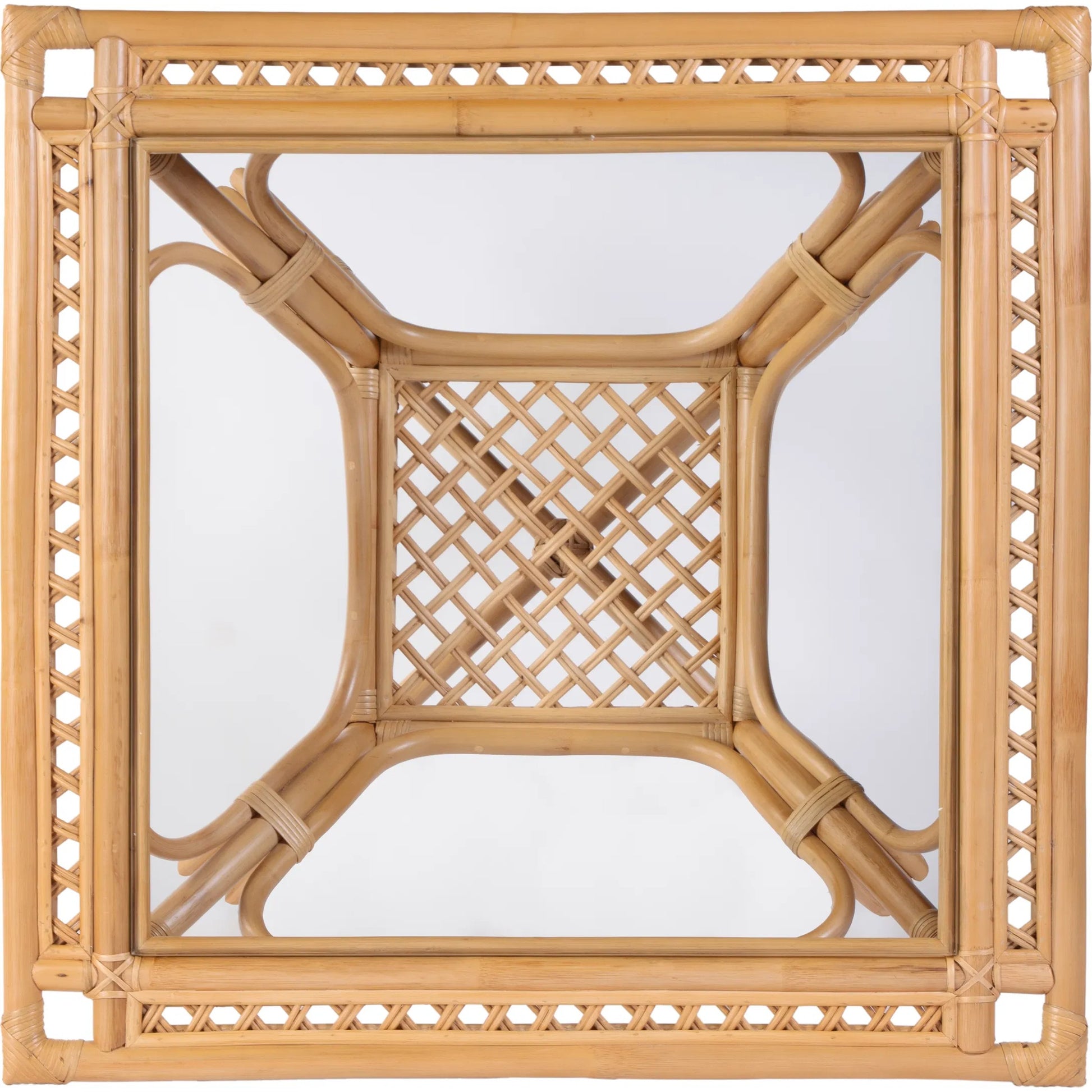 Antigua Dining Table by Butler Specialty Company in natural rattan. Made from rattan, glass in a rustic style.