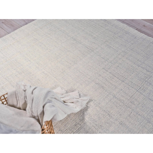 Alpine 5969 Rug by Exquisite Rugs in ivory. Made from new zealand wool in a unique style.