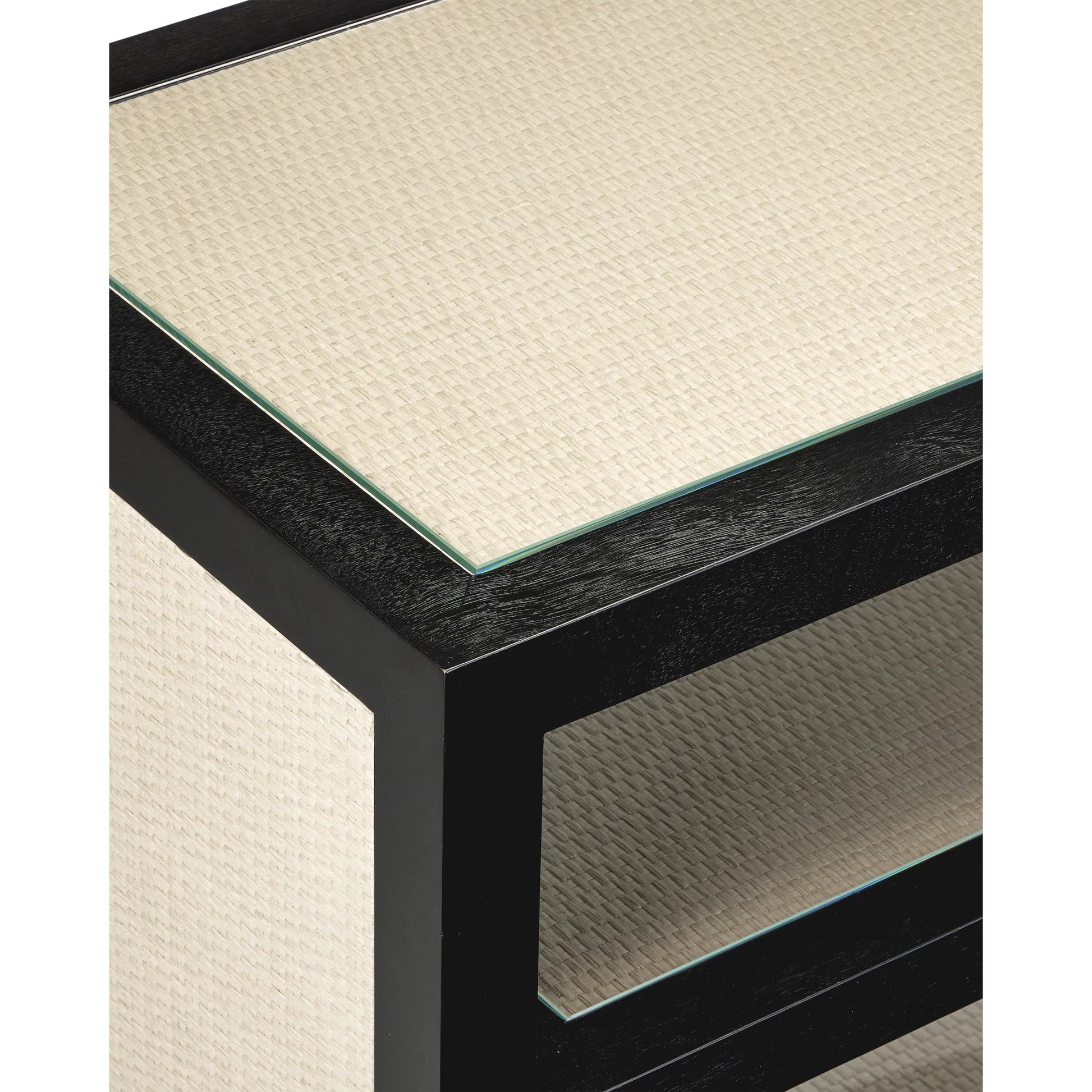 Deanna Console Table by Currey and Company in ivory, black, brushed brass, clear. Made from raffia, okume veneer, engineered hardwood, stainless steel, glass in a modern style.