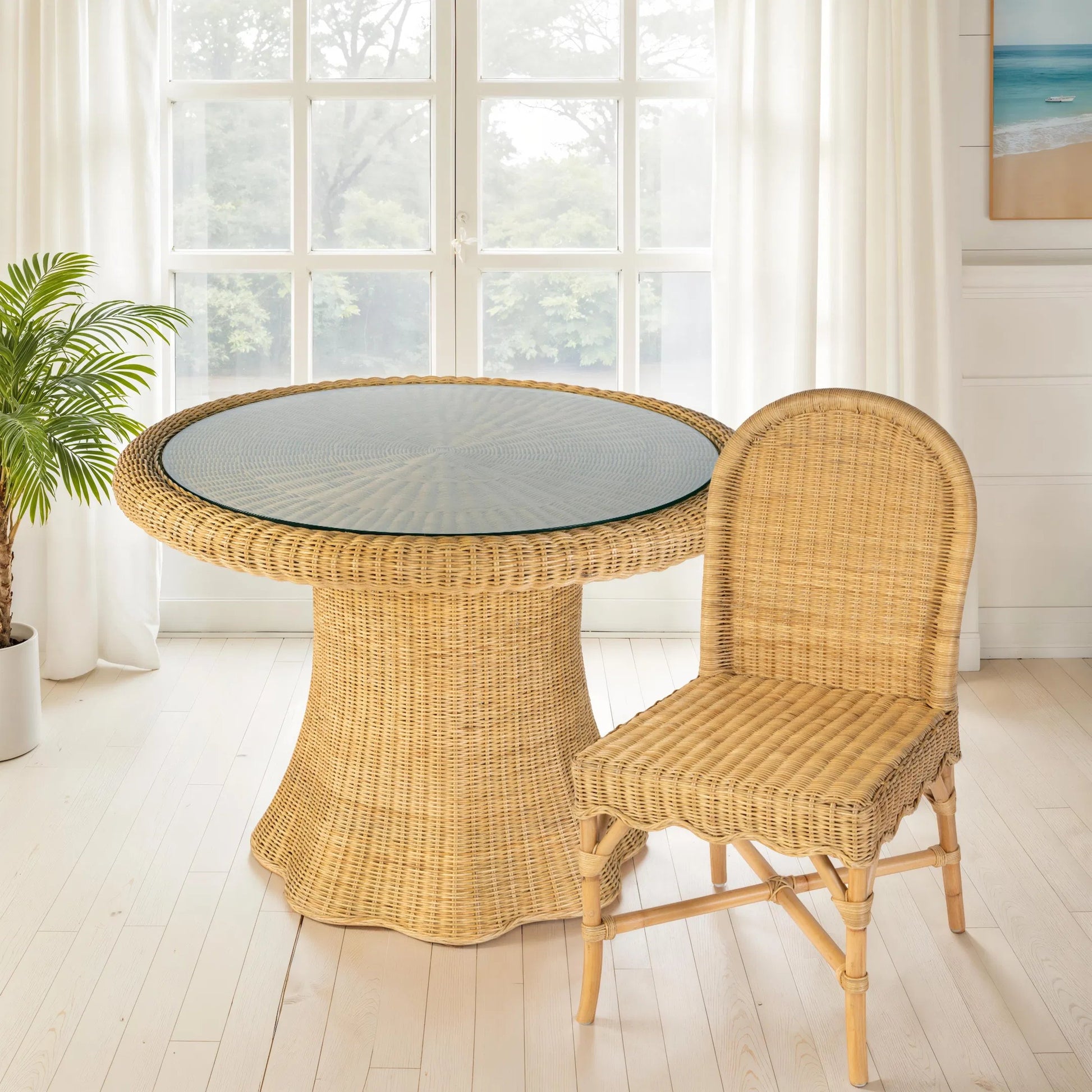Flora Dining Table by Butler Specialty Company in natural rattan. Made from rattan, misc wood, plywood, clear glass in a rustic style.