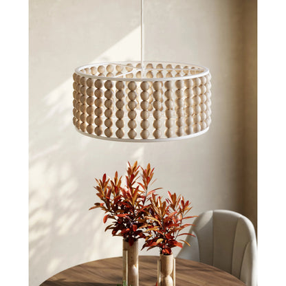 Holcroft Chandelier by Currey and Company in sandstone, sugar white. Made from wood beads, wrought iron in a modern style.