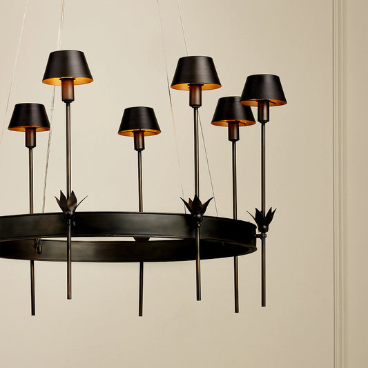 Coterie Chandelier by Currey and Company in bronze, gold. Made from wrought iron in a modern style.