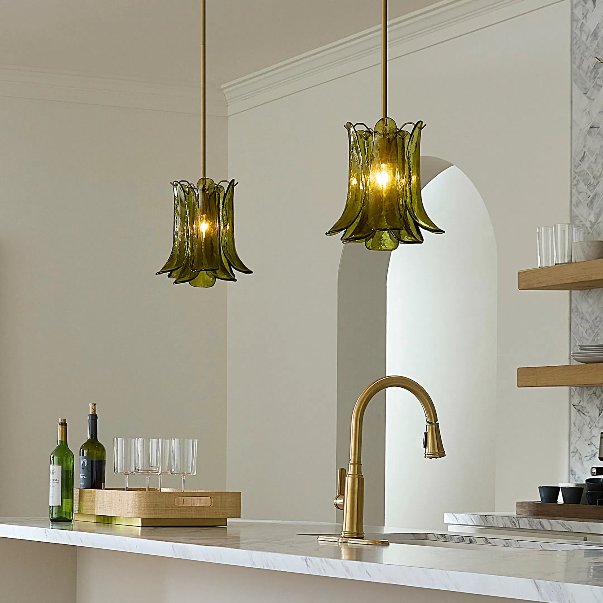 Cala Pendant by Jamie Young. Made from glass, metal: iron in a modern style.