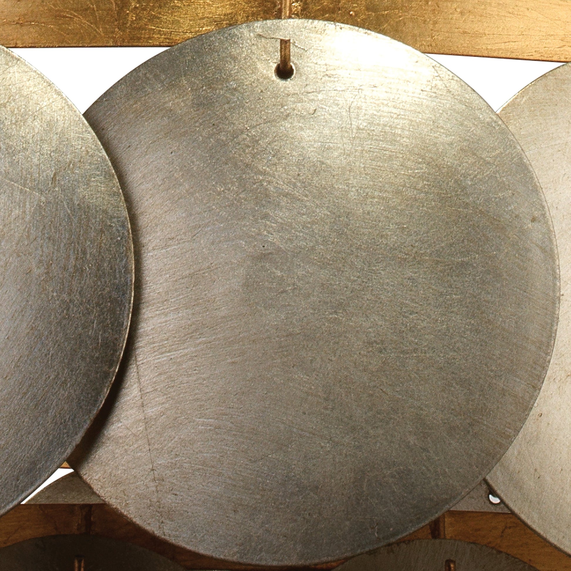 Calypso Chandelier by Jamie Young in champagne leaf with gold leaf trim. Made from iron in a eclectic & global style.