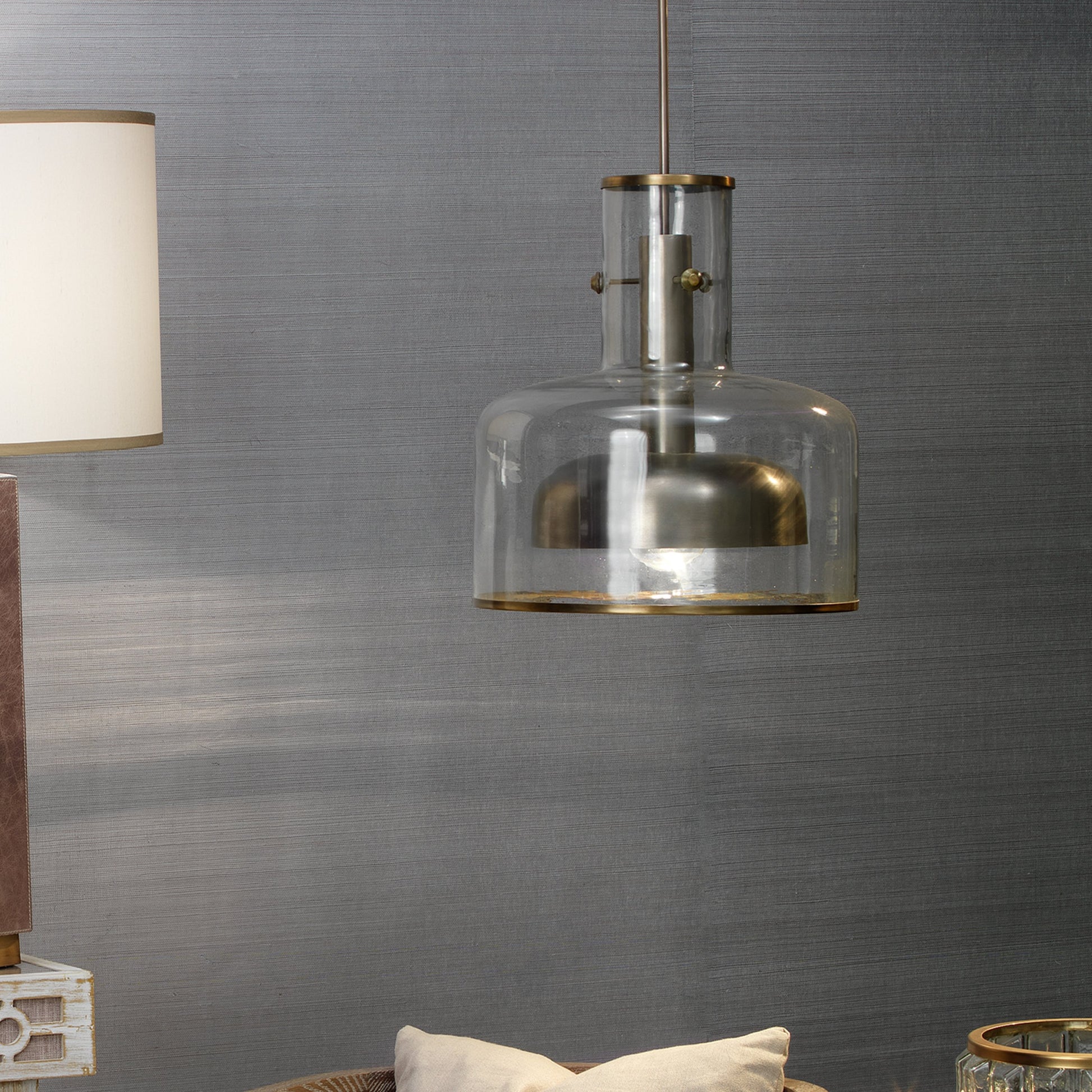 Clyde Pendant by Jamie Young in clear with gun metal. Made from glass in a modern style.