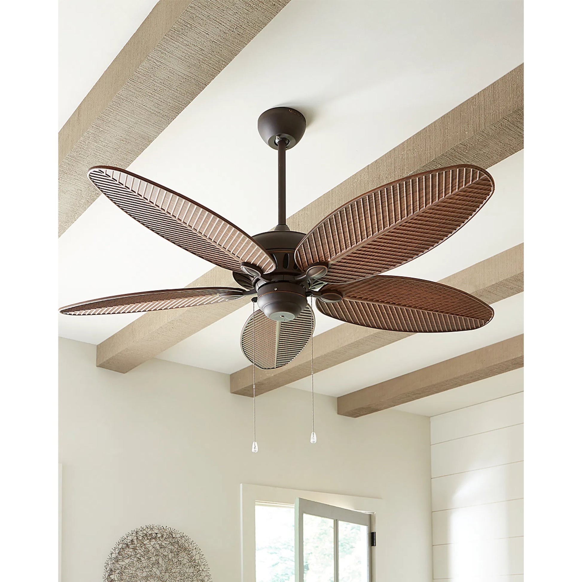 Cruise Palm Leaf Outdoor Fan by Monte Carlo. Made from unique in a coastal style.