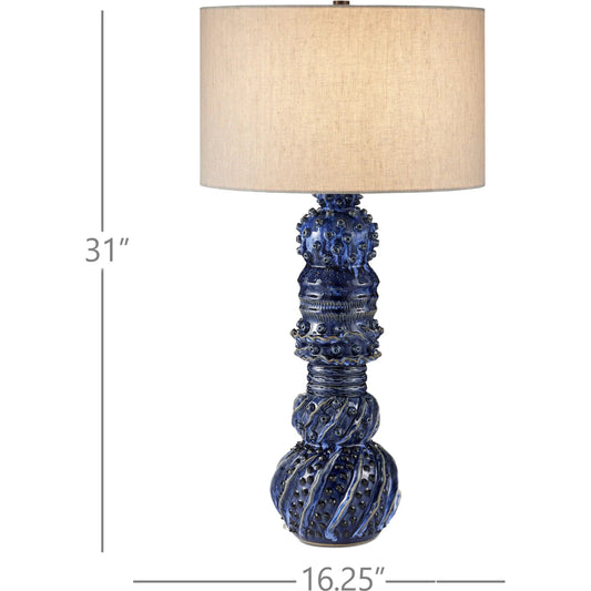 Undersea Table Lamp by Currey and Company in dark blue reactive. Made from ceramic in a unique style.