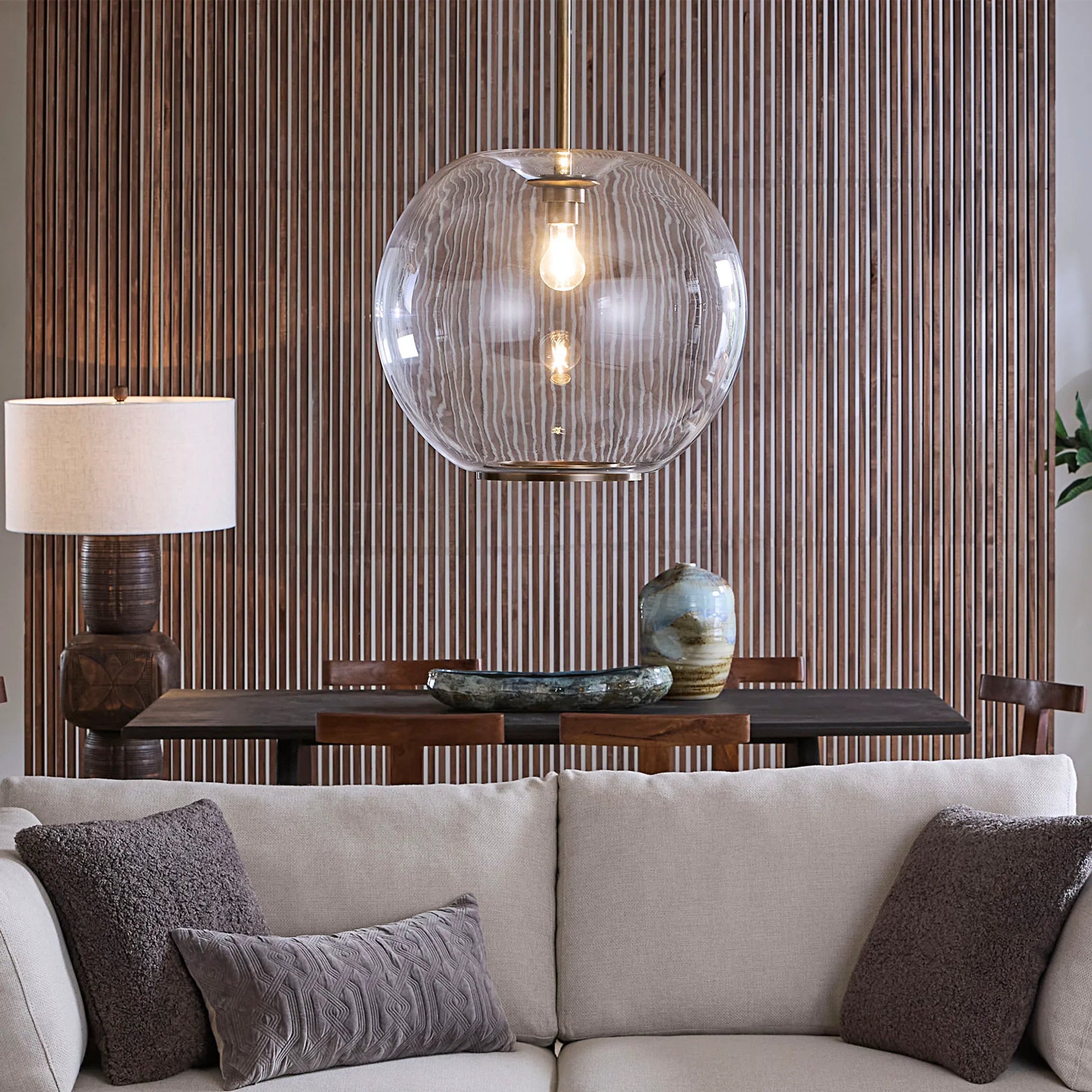 Helium Pendant by Jamie Young in clear and clear glass, brass. Made from glass, metal: steel in a modern style.