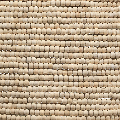 High Tide Pendant by Jamie Young in off white beads. Made from iron, mango wood in a coastal style.