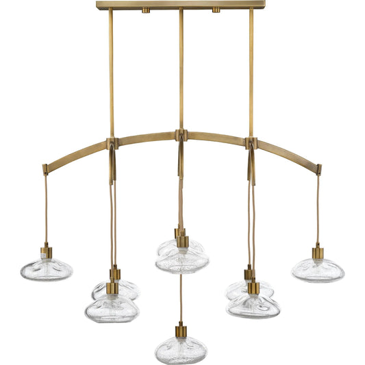 Reservoir Chandelier by Jamie Young in antique brass. Made from glass in a unique style.