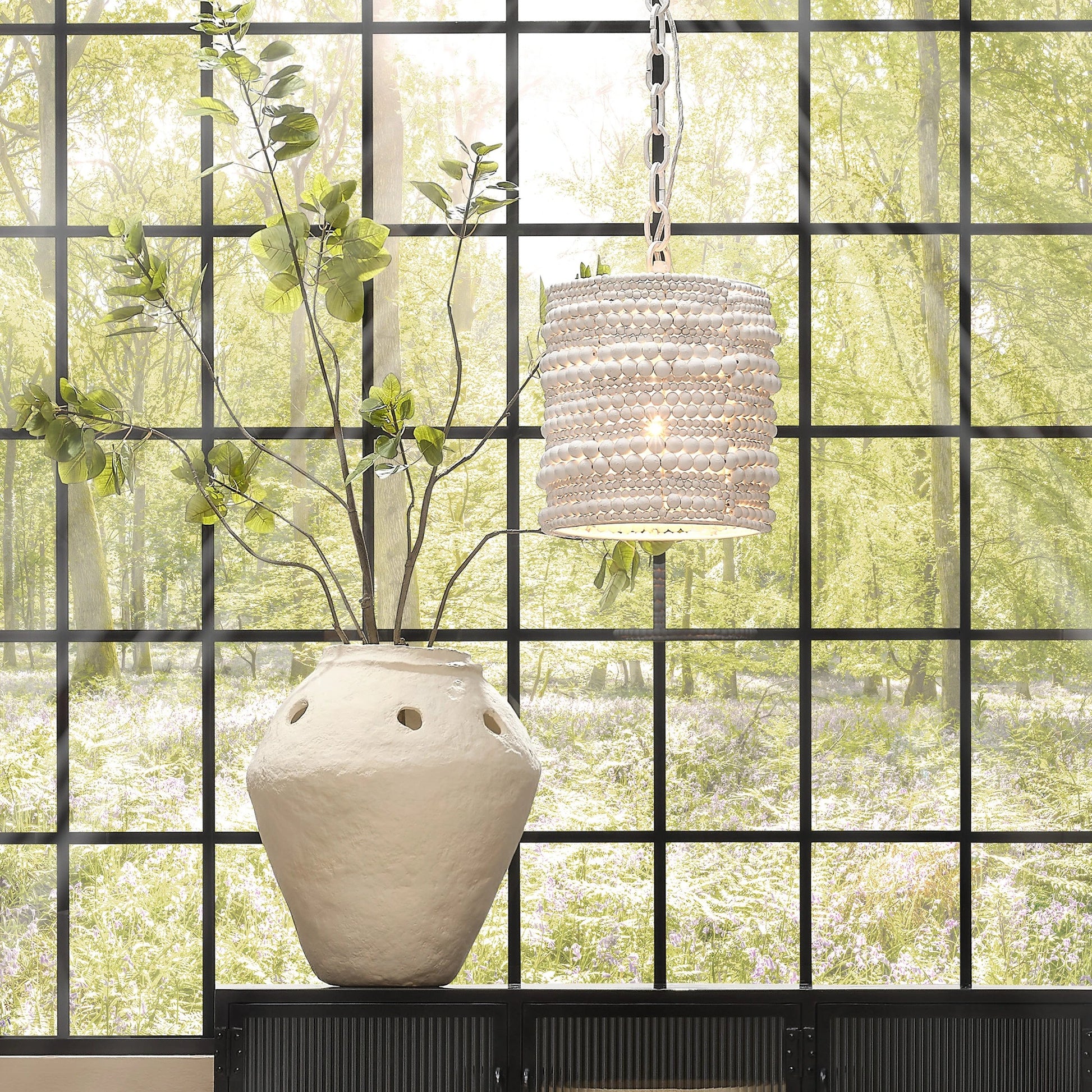 Strand Pendant by Jamie Young. Made from mango wood, metal: iron in a coastal style.