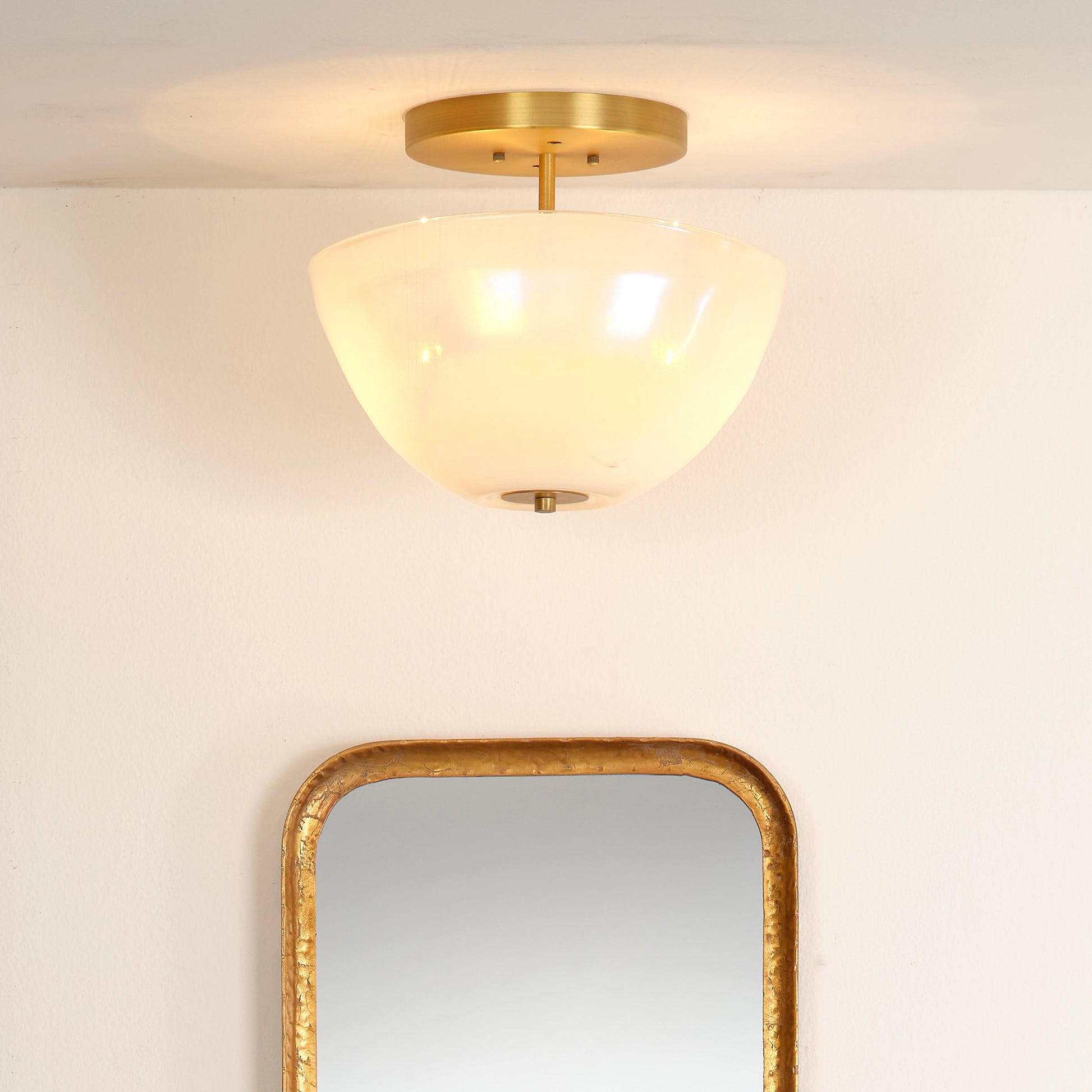 Vapor Bowl Semi-Flush Mount by Jamie Young in antique brass, grey metallic glass. Made from glass in a modern style.