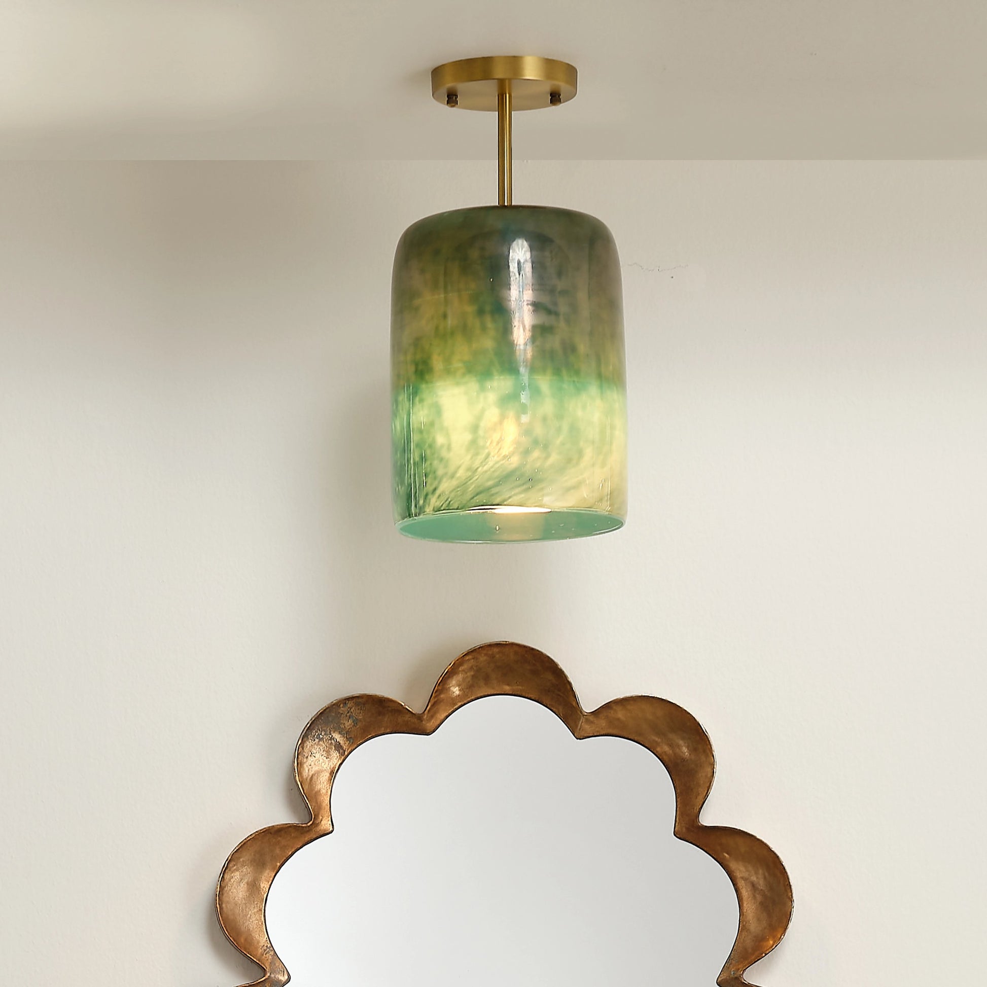 Vapor Semi-Flush Mount by Jamie Young in antique brass, aqua metallic glass. Made from glass in a modern style.