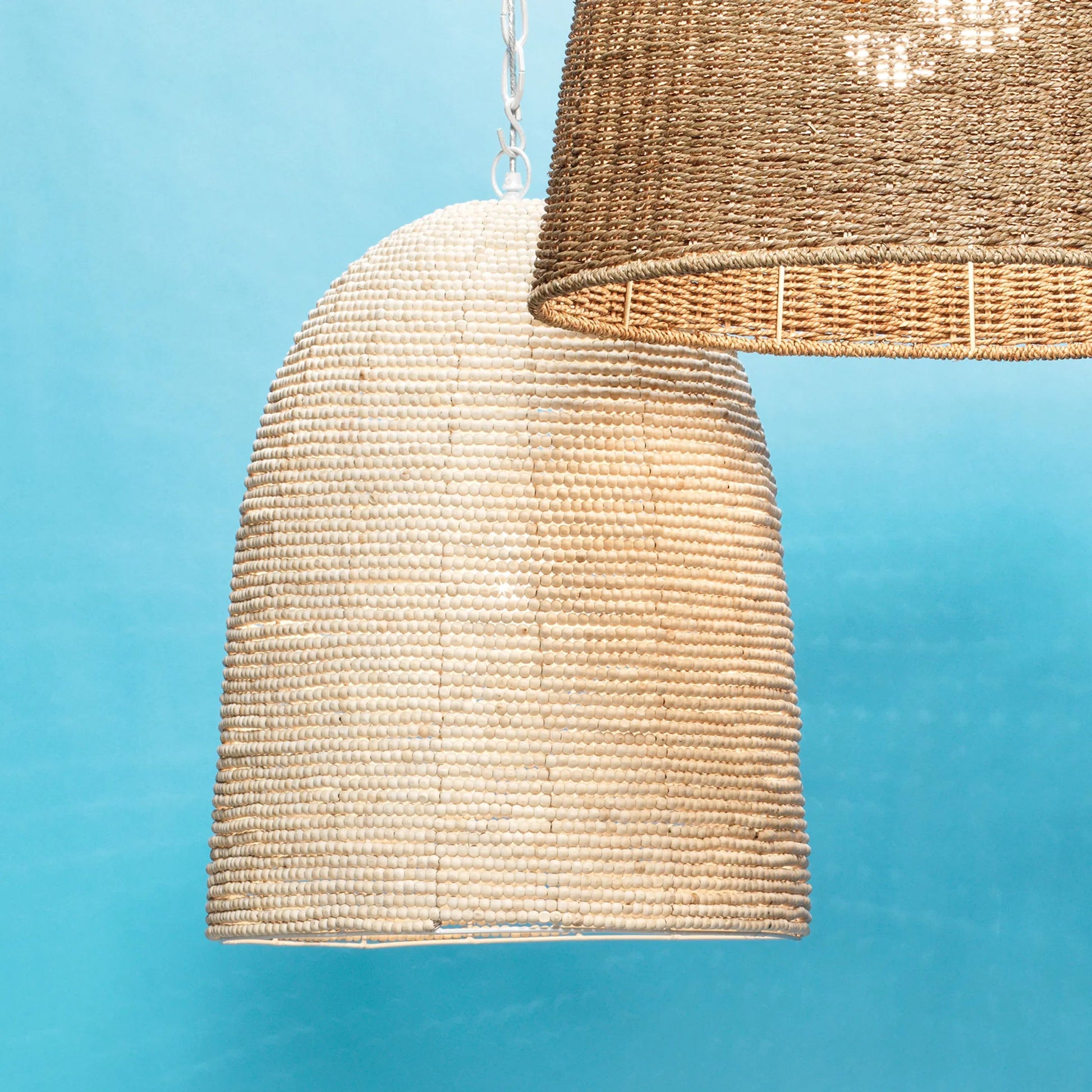 Waterfront Pendant by Jamie Young in off white. Made from iron, mango wood in a coastal style.