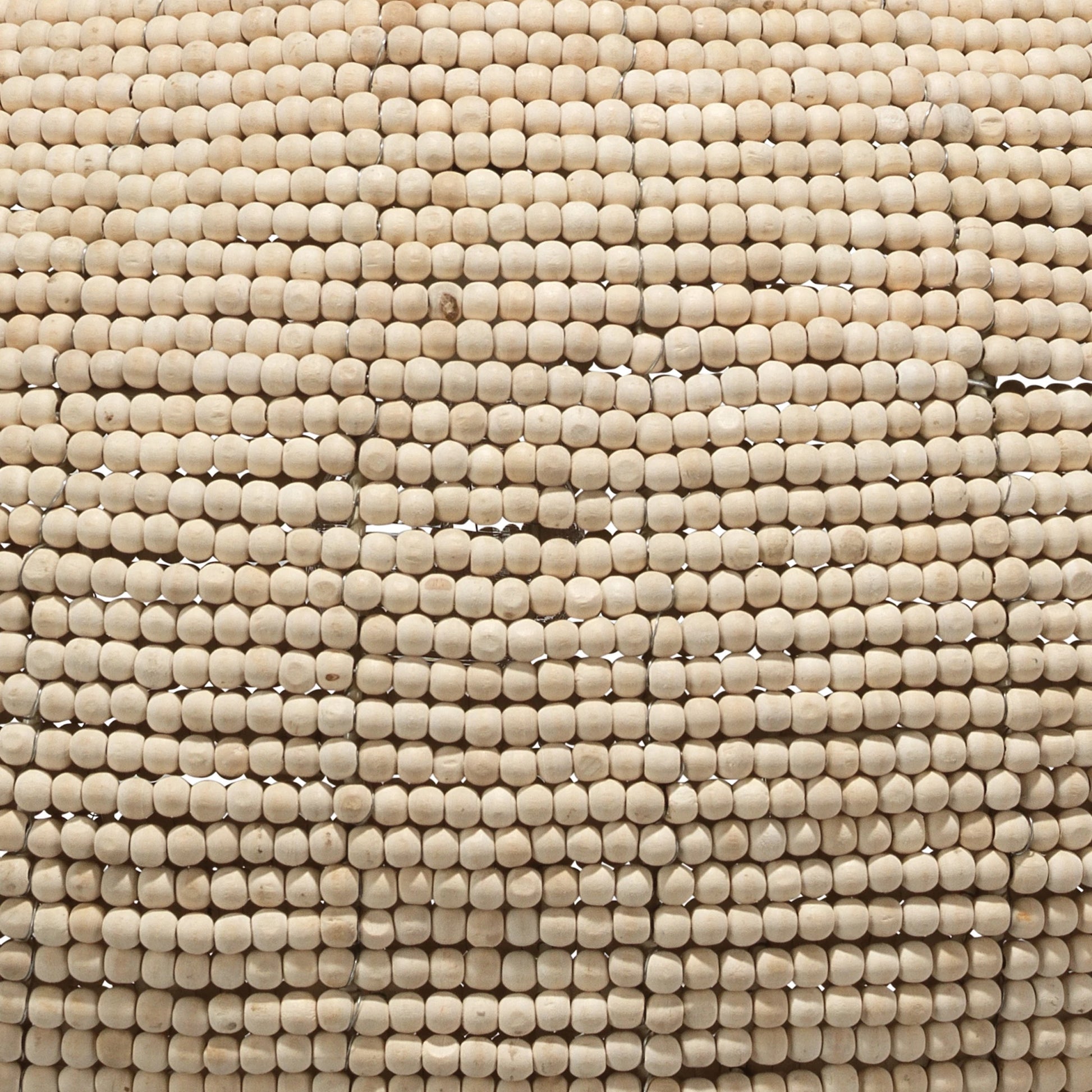 Whirlpool Pendant by Jamie Young in off white beads. Made from iron, mango wood in a coastal style.