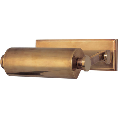 Merrick Picture Light by Hudson Valley. Made from brass in a transitional style.
