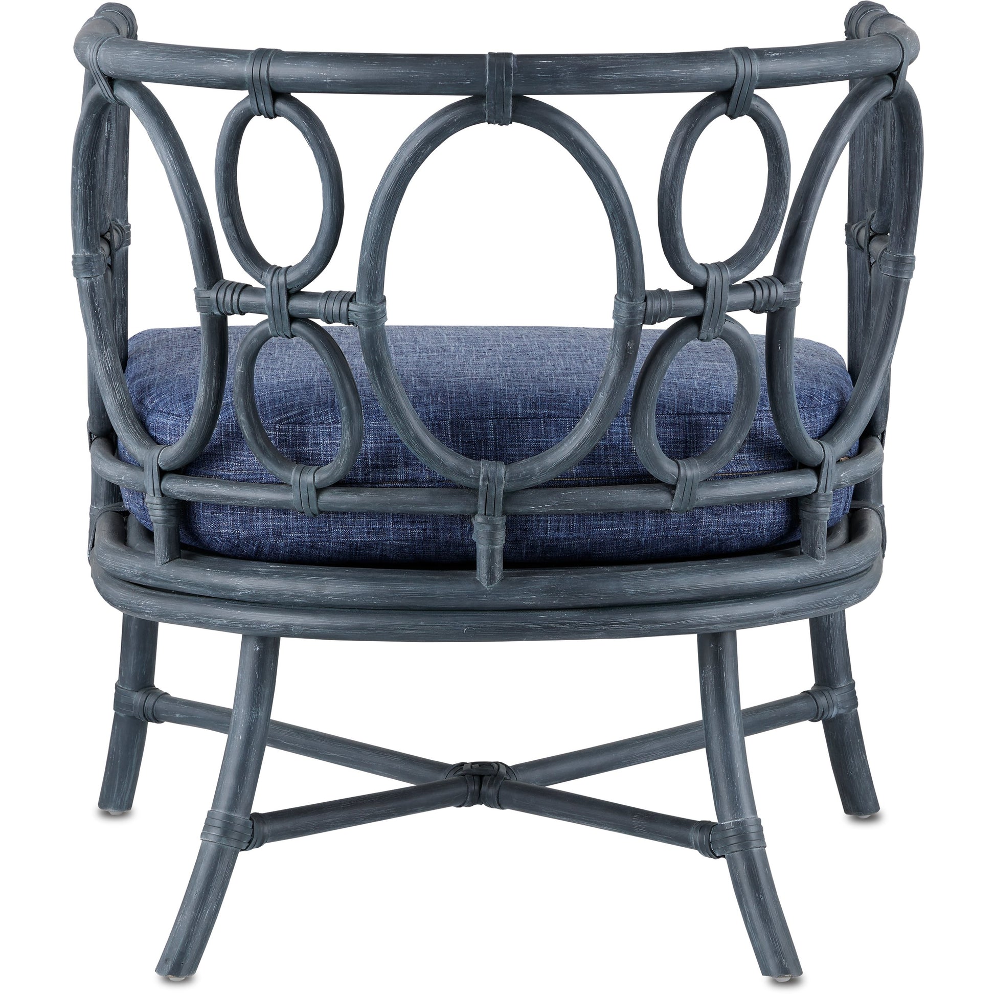 Tegal Chair by Currey and Company in vintage navy, indigo. Made from rattan, plywood, fabric, foam in a coastal style.
