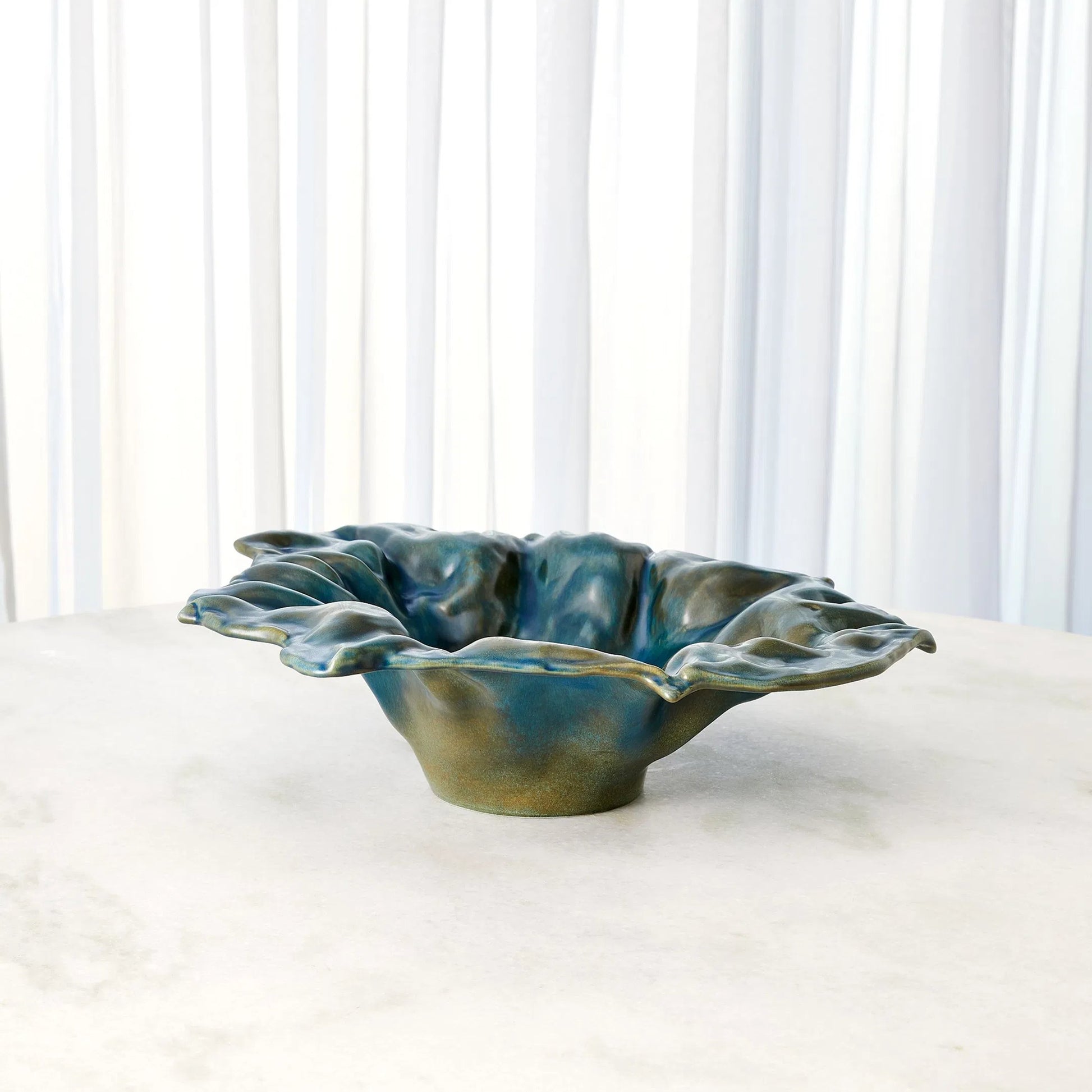Free Form Blue Bowl by Global Views in reactive blue. Made from ceramic in a eclectic & global style.
