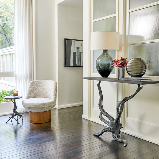 Monterey Table by Global Views in natural iron. Made from iron, honed black marble in a unique style.