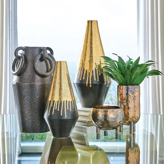 Gold Drip Vase by Global Views in gold. Made from unique in a modern style.