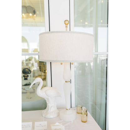 Adele Lamp by Wildwood in natural white, antique brass. Made from stone in a transitional style.