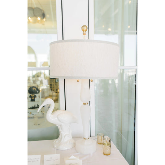 Adele Lamp by Wildwood in natural white, antique brass. Made from stone in a transitional style.