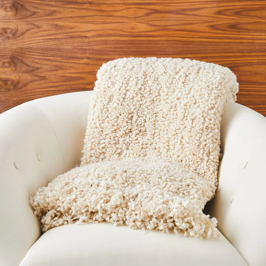 Textured Boucle Throw by Global Views in natural. Made from 100% polyester in a rustic style.