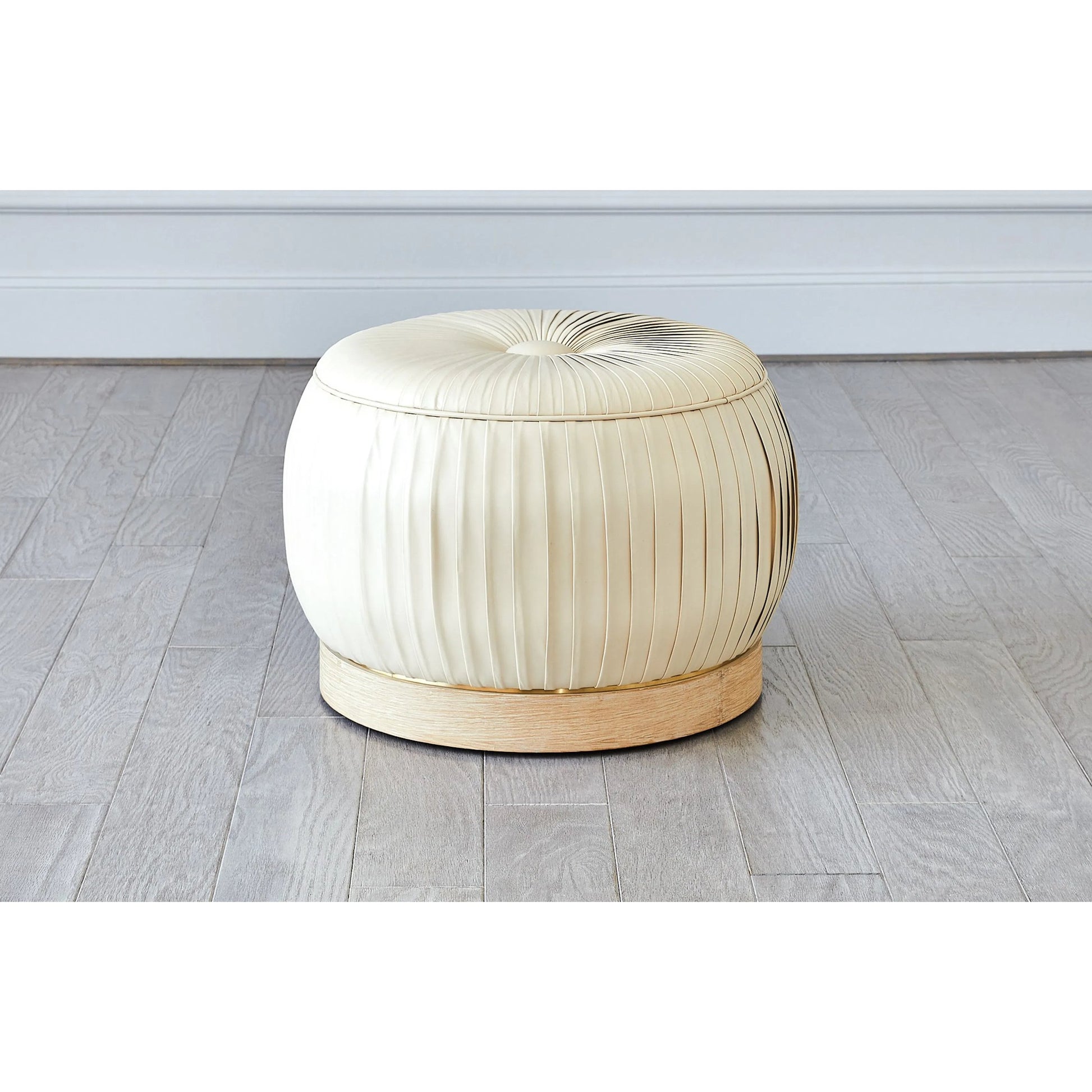 Colette Pouf by Global Views. Made from brass, leather in a modern style.