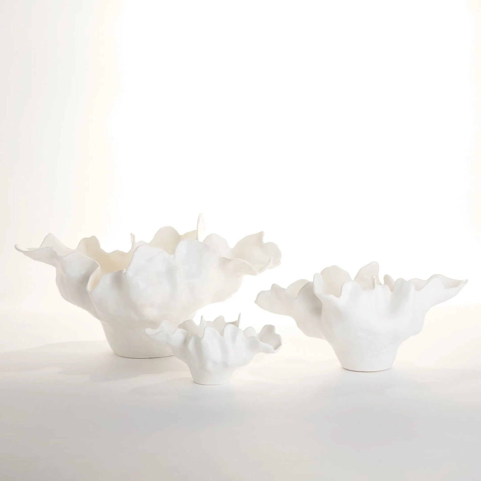 Meteor Bowl by Global Views. Made from ceramic in a coastal style.