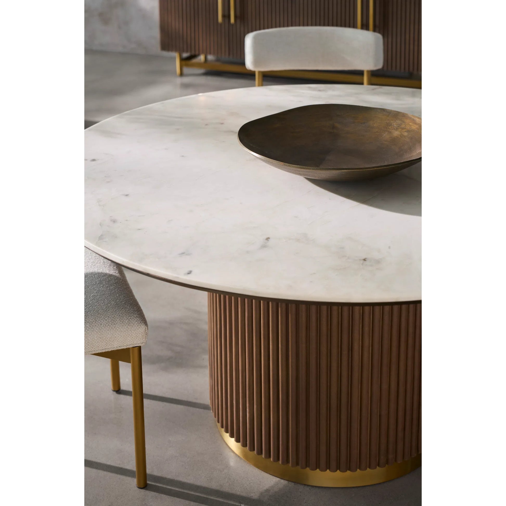 Dimitri Leather Wrapped Round Dining Table by Fairfield Chair in brown and kafe. Made from marble, leather wrap in a unique style.