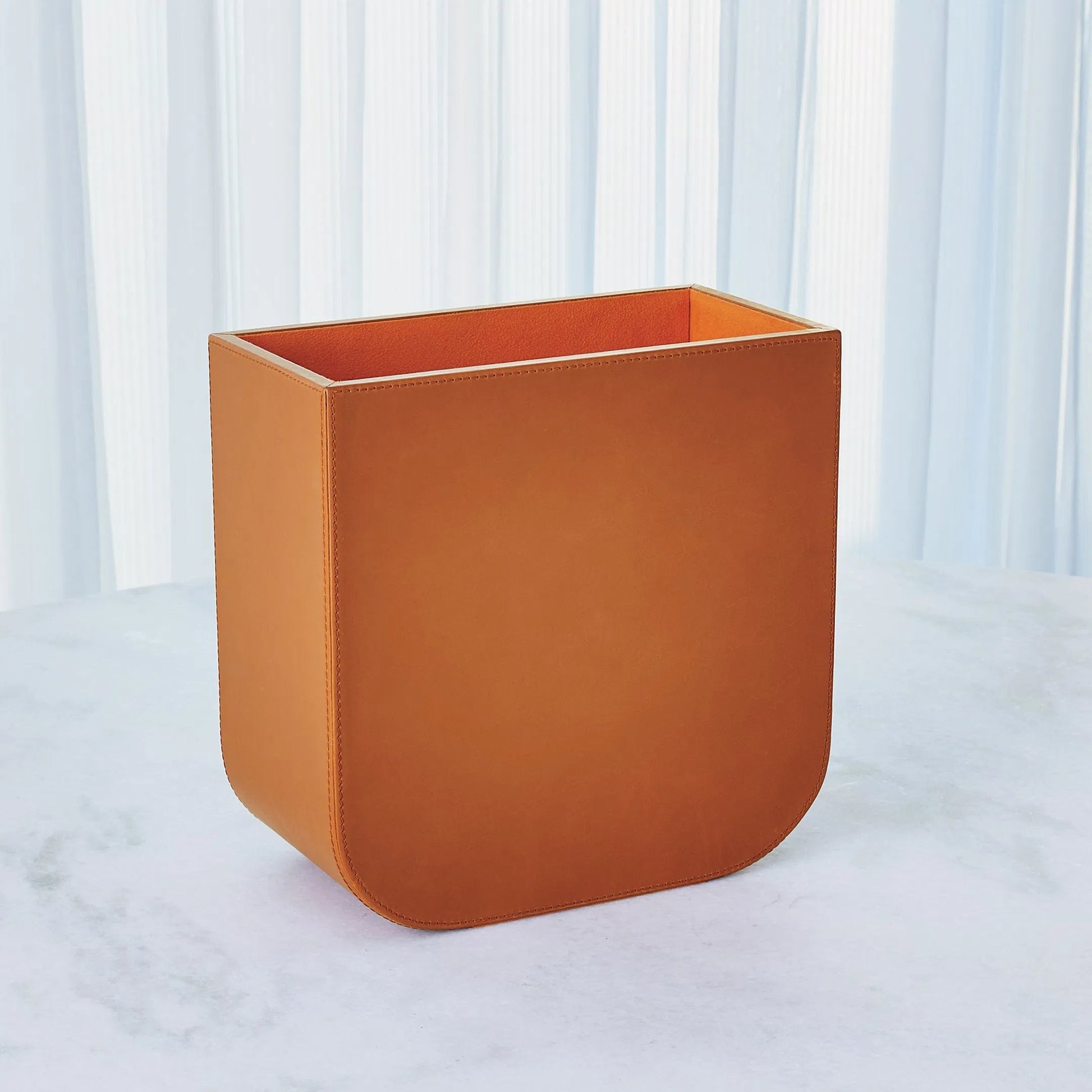 Radius Edge Leather Wastebasket by Global Views. Made from unique in a transitional style.