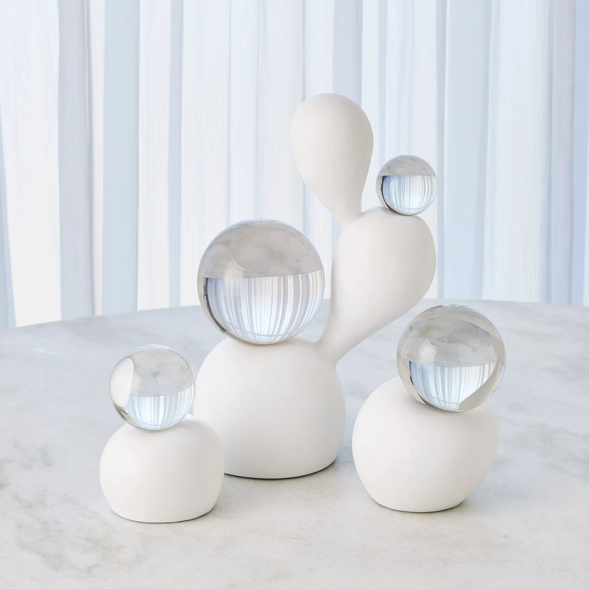 Single Meringue Sculpture by Global Views in white, crystal. Made from plaster, crystal in a modern style.