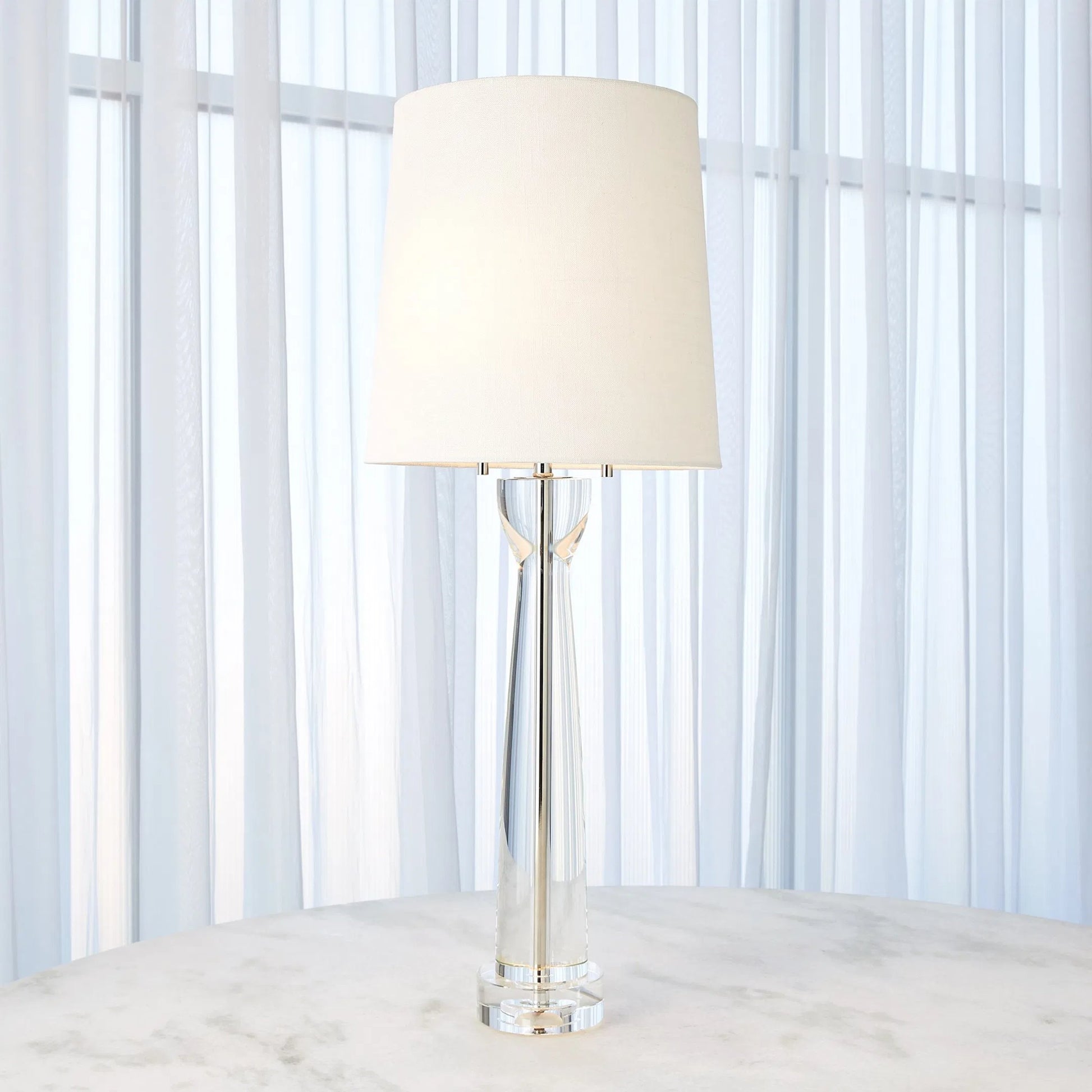 Modern Crystal Column Lamp by Global Views. Made from crystal, linen in a transitional style.