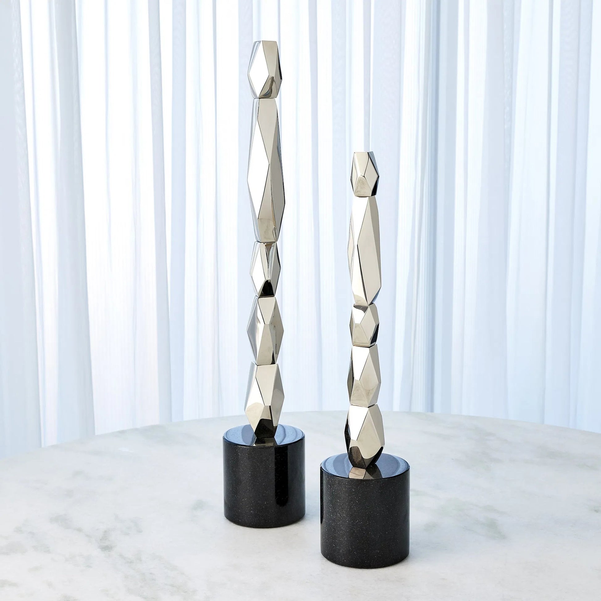 Facet Block Sculpture by Global Views. Made from unique in a unique style.