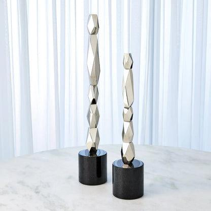 Facet Block Sculpture by Global Views. Made from unique in a unique style.