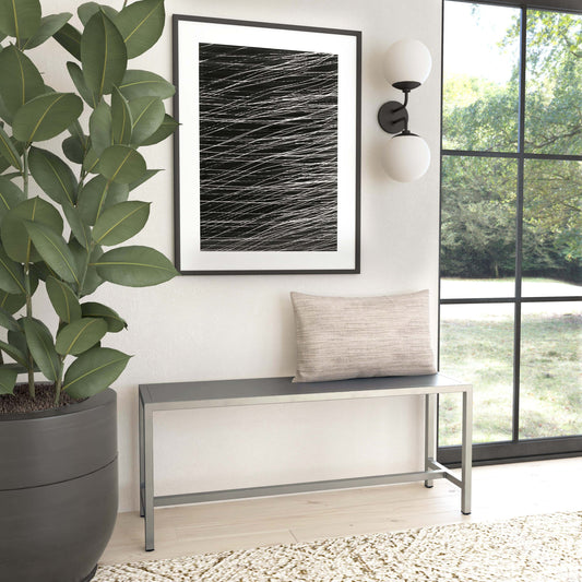 Tribeca Iron Bench by Butler Specialty Company in silver and metalworks. Made from iron in a modern style.