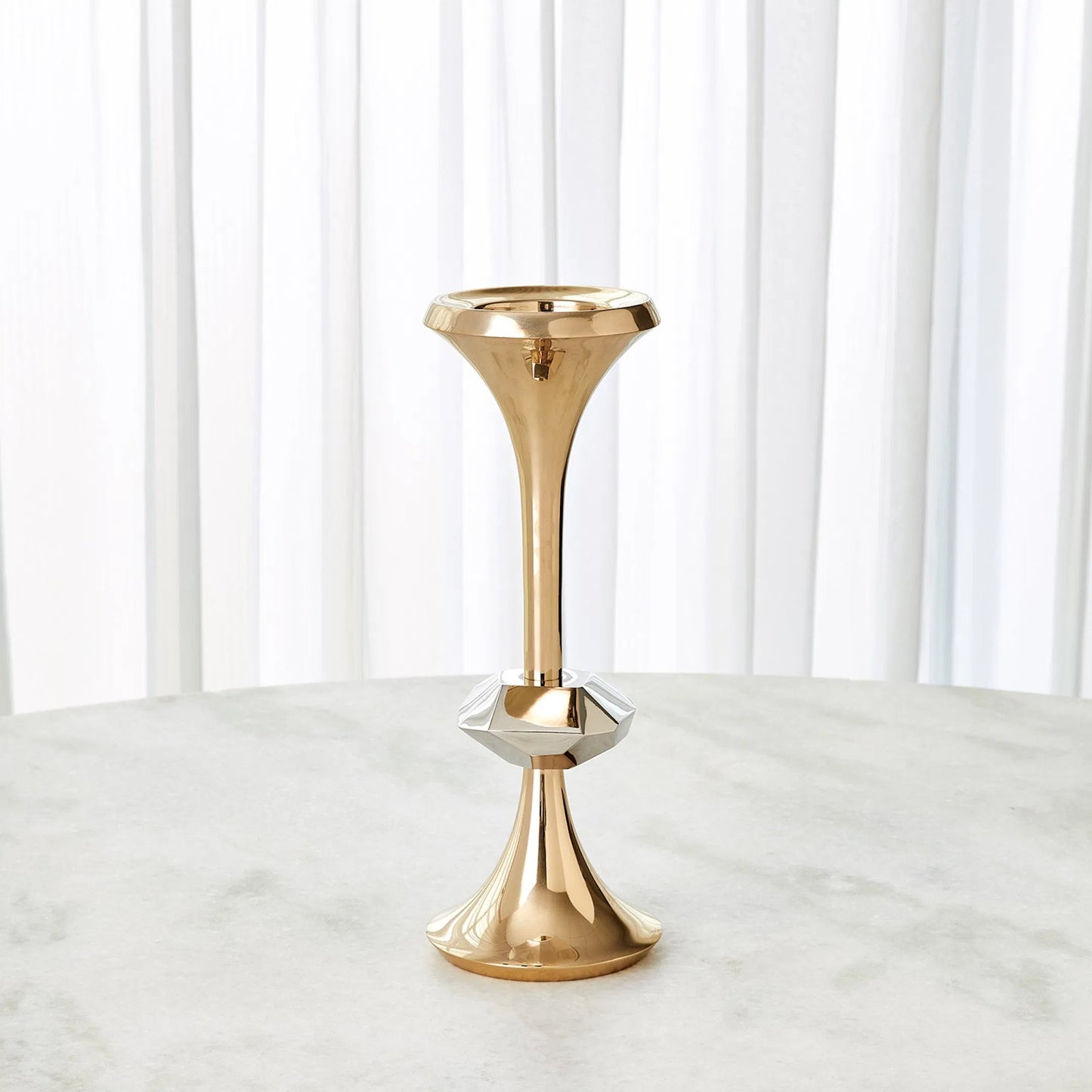 024 SI-2446289 | Lifestyle | Gabriel Brass Candle Holder by Global Views. Made from brass in a modern style.