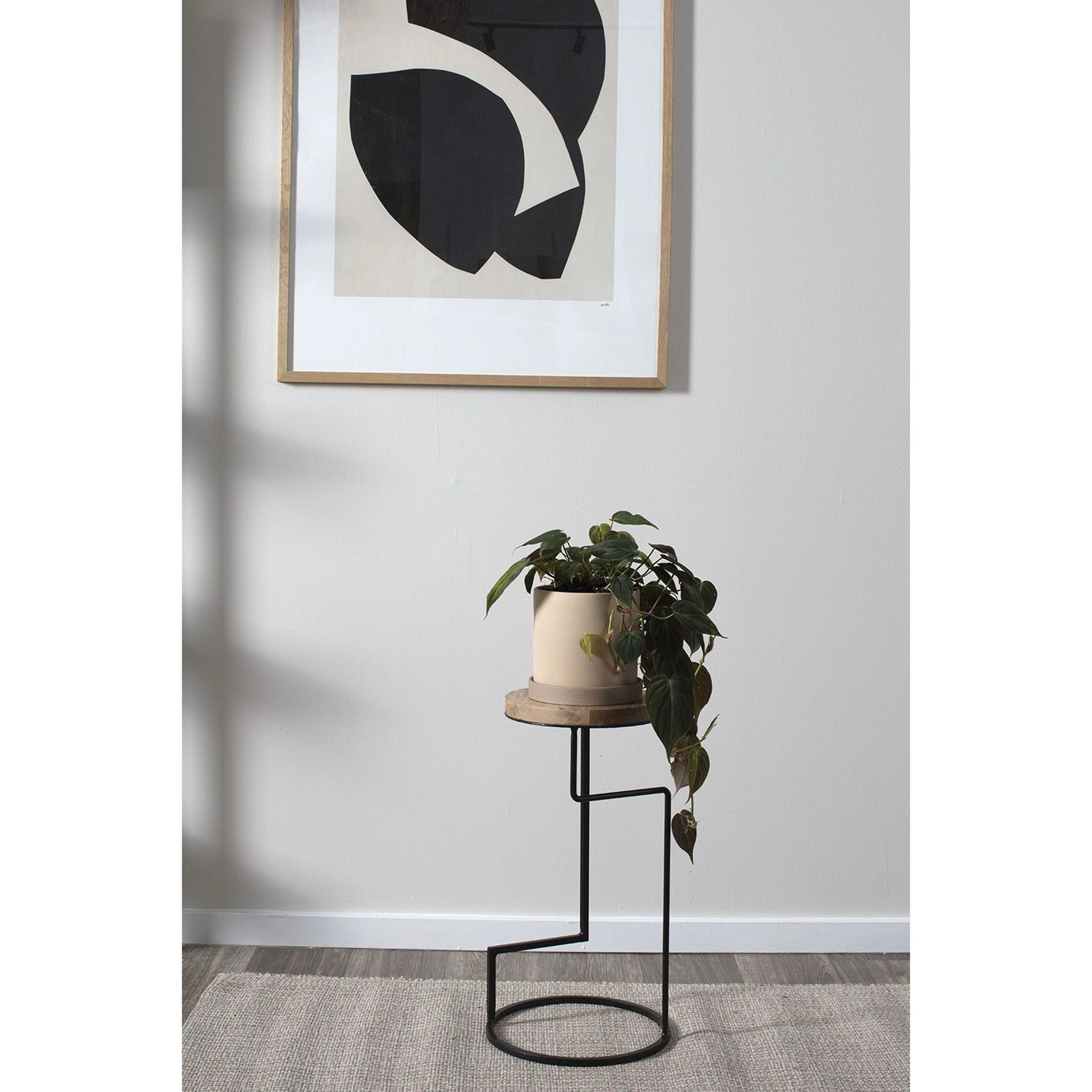 Wassily Stand by Accent Decor in black. Made from metal in a modern style.